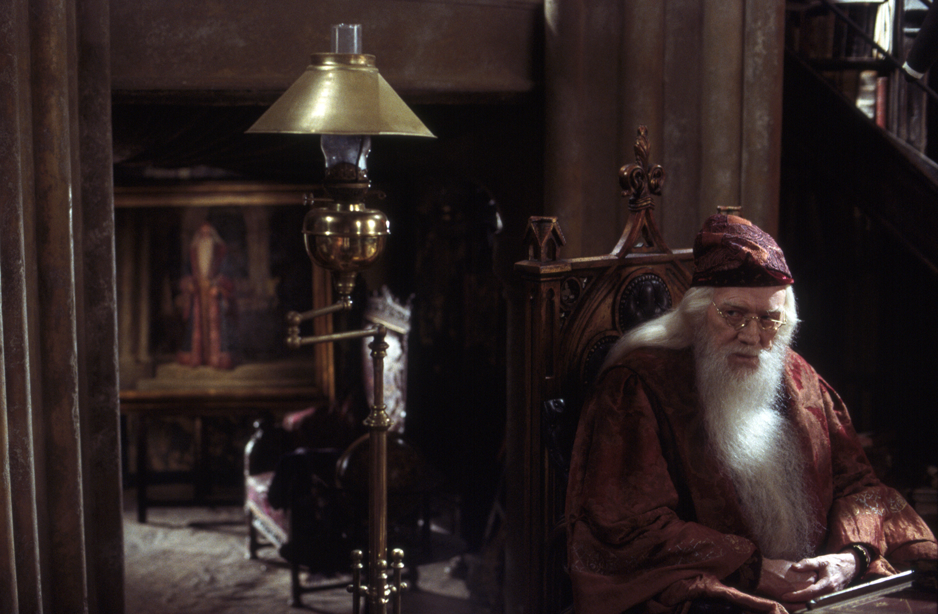 HP-F2-albus-dumbledore-in-his-office-with-portrait-in-background-web-landscape