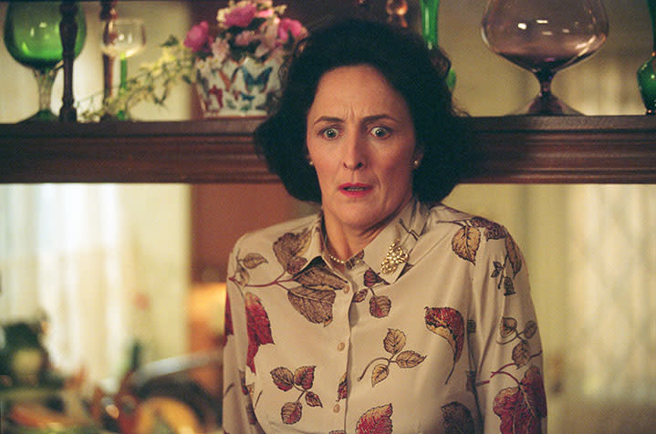 Aunt Petunia stands back in the Privet Drive kitchen with a shocked expression on her face