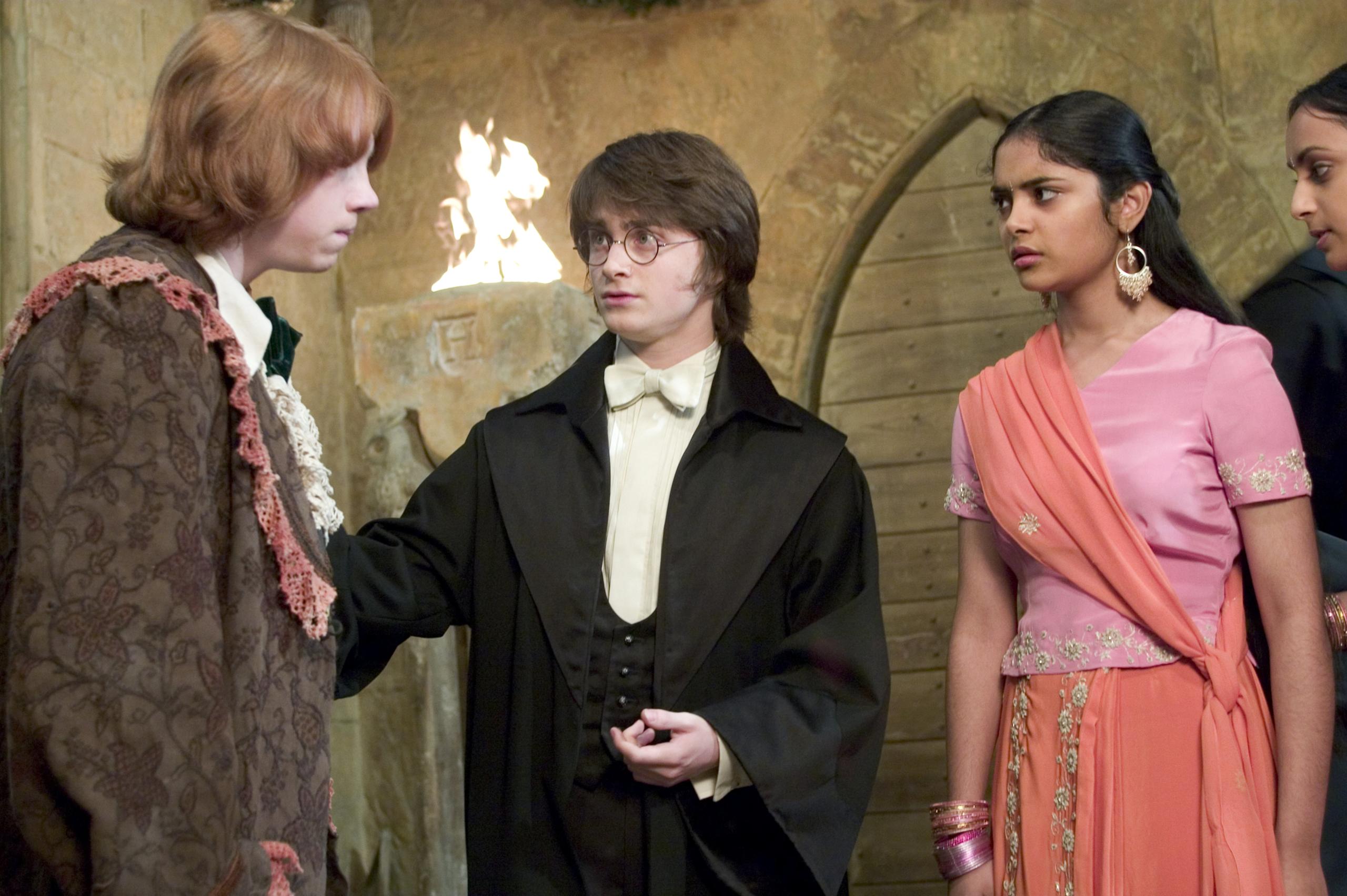 HarryPotter WB F4 HarryRonParvartiPadmaAtYuleBall Still 080615 Land