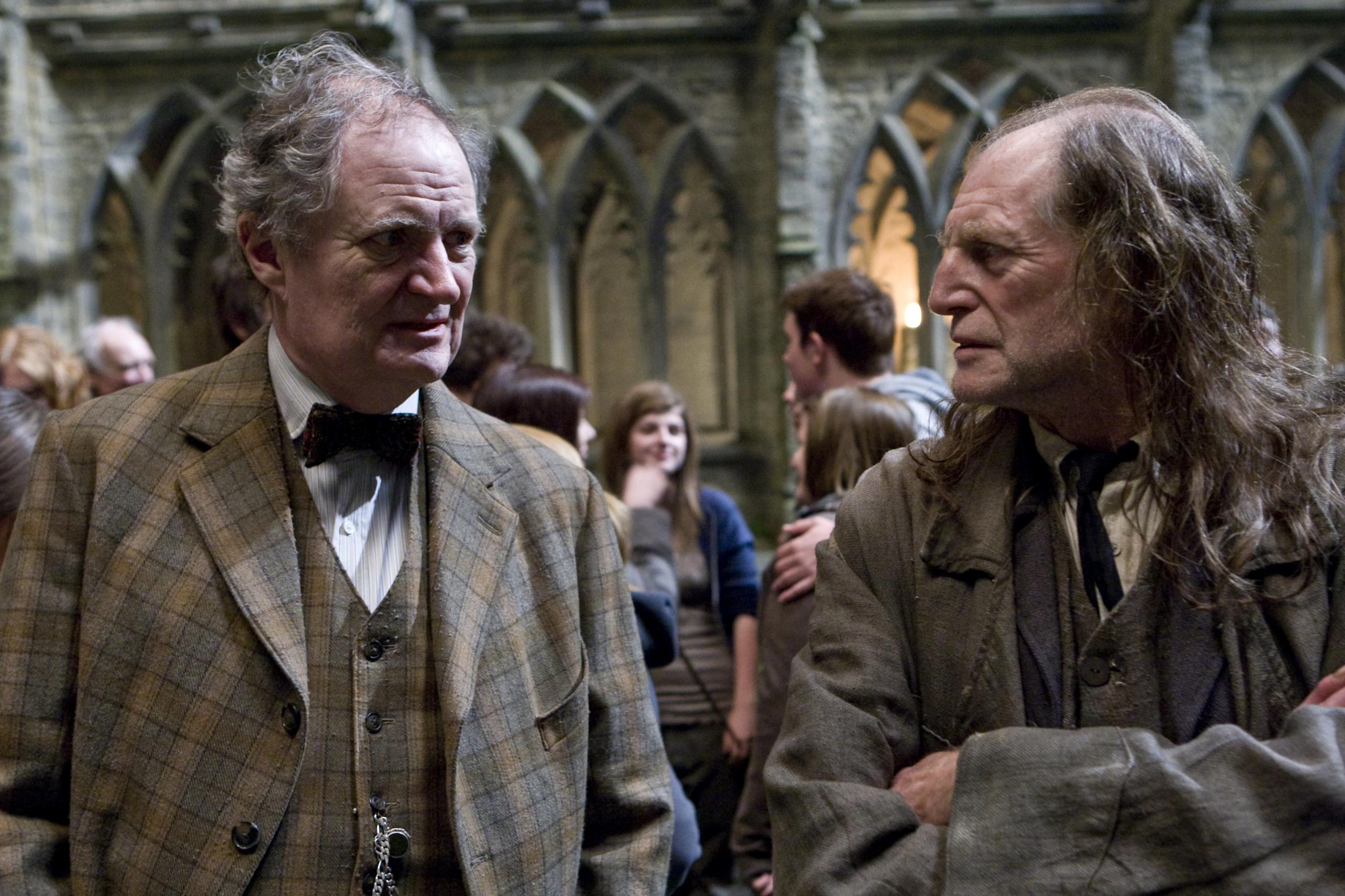 WB F6 Argus Filch Professor Slughorn standing HP6D-09717