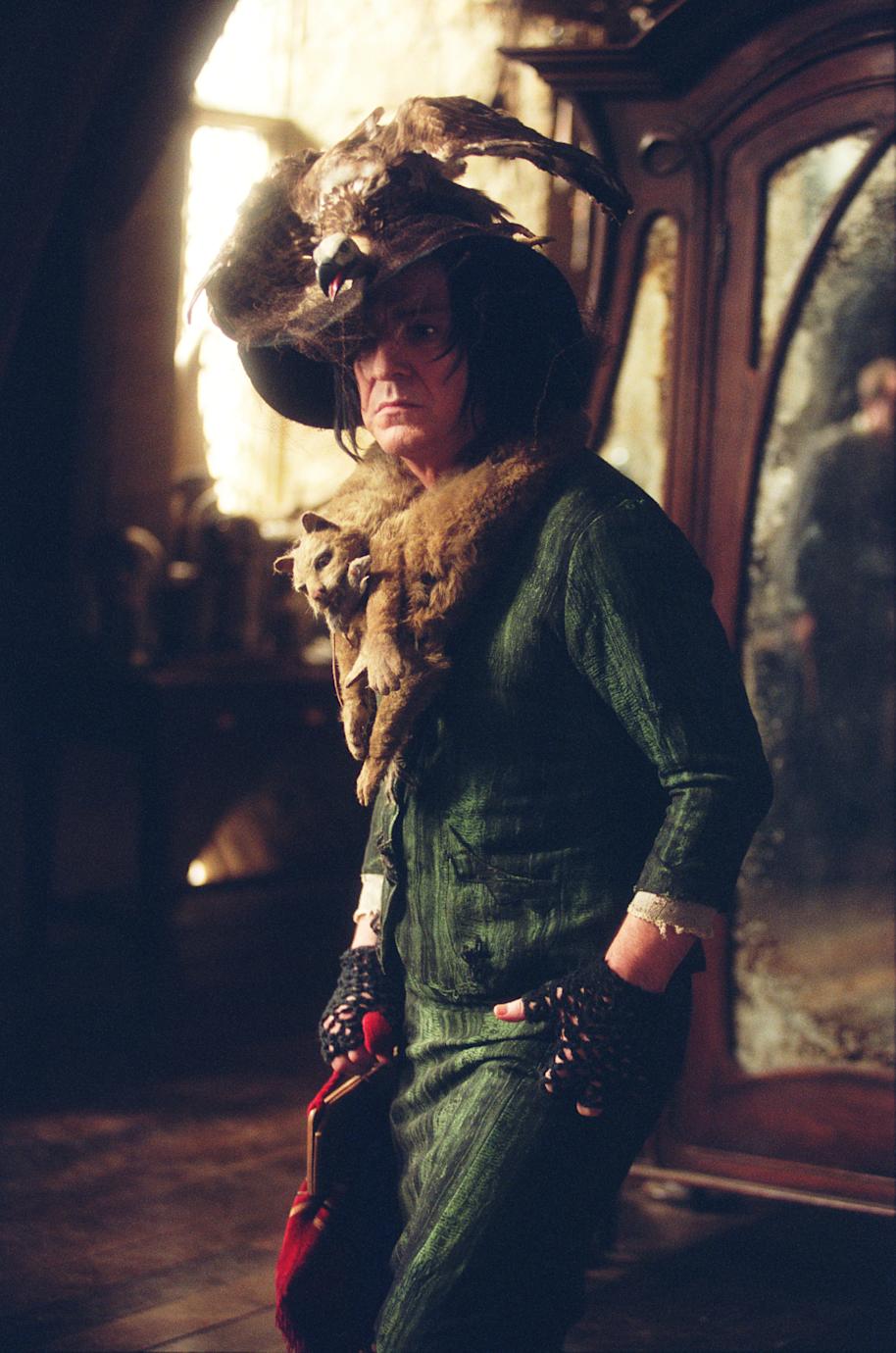 Snape dressed in Nevilles grandmothers clothes