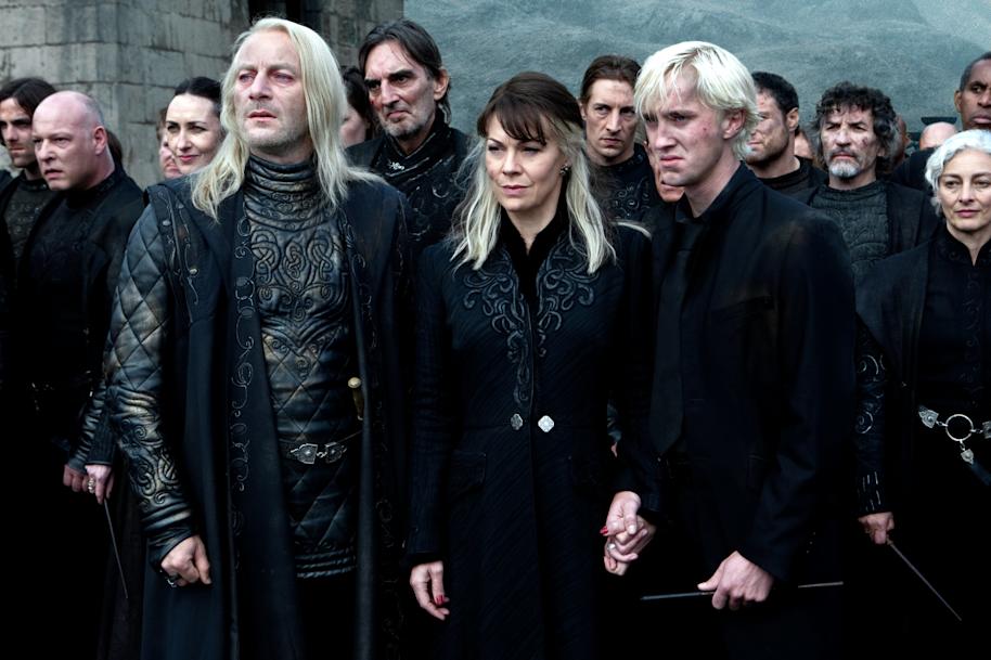 Narcissa in between Lucius and Draco at the final battle 